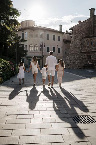 Big happy family walking away hand by hand during a day trip in Italy. Back view and shadows.
Pre-Opening picture pool, stock photos
Falkensteiner Resort Lake Garda